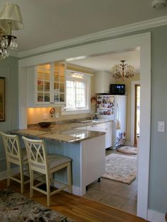 the kitchen is clean and ready to be used as a dining room or living room