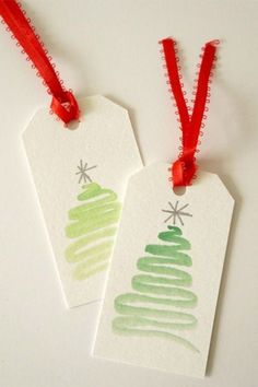 two tags with christmas trees on them