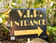 a sign that says v i p d entrance with an arrow pointing to the right