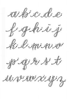 some type of cursive writing that is black and white with silver lettering on it