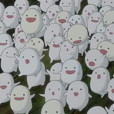 a large group of little white animals standing in the middle of an animated scene,