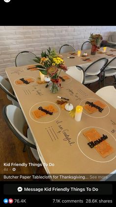 the table is set up for thanksgiving dinner