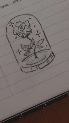 a drawing of a rose in a jar with writing on it