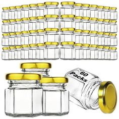 several glass jars with gold lids are shown