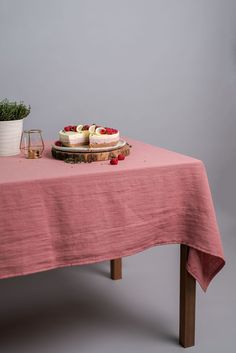 "Softened linen tablecloth. Dusty pink tablecloth for your dining table. Beautiful gift idea for cosy home. Perfect wedding table decor. Beautiful housewarming gift. - Accurately and attentively made linen tablecloth for cosy homes and dining tables. - Made from purely natural fabric, 100% softened Lithuanian linen. - Smooth, soft, light, but strong fabric. - OEKO-TEX Standard 100 certified fabric. - - - - - - - - - - - - - - - - - - - - AVAILABLE SIZES (choose from dropdown menu): 100x100 cm / Pink Tablecloth, Linen Table Cloth, Natural Linen Fabric, Pink Table, Table Set Up, Square Tablecloth, Pink Linen, Vintage Games, Dining Table Decor