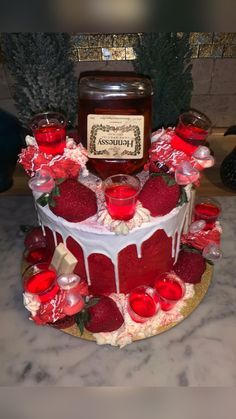 a cake with jam and strawberries on it