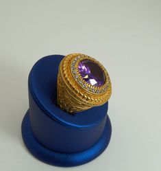 "Classic ring with a large amethyst. Such rings are traditionally called «bishop ring\". Since each time, according to the order, the ring is made from zero, it can be personalized. Amethyst quality AAAA, diameter 16mm. 14KGold. Diameter of the ring is 30mm. Weight 42g. Diamonds quality VS2 - 0.99Ct. 14k Gold, weight 42g. Sizes from 9 (18.9мм) to 13 (22.4mm)." Luxury Gold Amethyst Ring Gift, Luxury Gold Amethyst Ring With Center Stone, Luxury Collectible Purple Rings, Luxury Hallmarked Amethyst Collectible Ring, Bishop Ring, Diamonds Purple, Golden Rings, Mens Gold Rings, Golden Ring