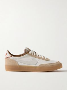 Nike's 'Killshot' sneakers debuted in 1979 as an on-court performance style. Inspired by the original, this '2' version is made from leather and has suede accents and signature 'Swooshes'. Gum rubber soles and embroidered monikers at the heel tabs add to the old-school feel. Men’s Casual Sneakers, Mens Everyday Shoes, Men’s Sneakers, Trendy White Sneakers, Nike Dunks Outfit, Shoe Maker, Everyday Sneakers, Nike Shoes Women Fashion