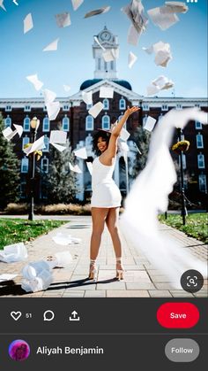 an image of a woman throwing papers in the air