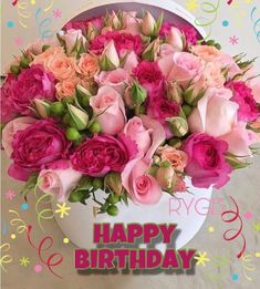 a birthday card with pink and red flowers