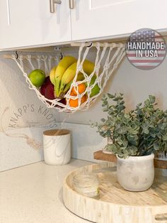 a basket filled with fruit sitting on top of a counter