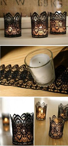 some candles are sitting on a table with lace doily around them and one candle is lit