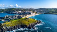 an aerial view of the coastline and town