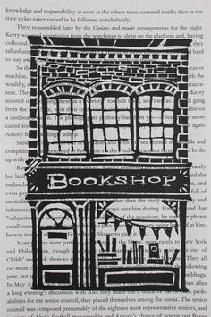 an open book with a drawing of a storefront on it's front page