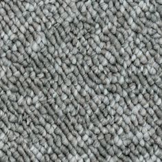 an up close shot of the texture of a carpet with grey and white colors on it