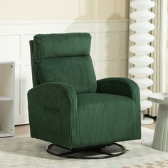 a green recliner chair sitting on top of a white rug in a living room