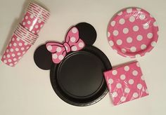 minnie mouse party supplies including plates, cups and napkins