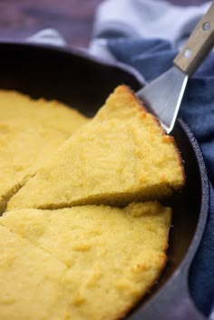 cornbread in a skillet with a spatula