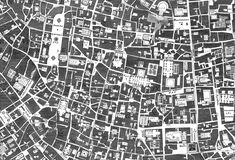 a black and white image of a city map with lots of buildings, roads and streets