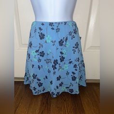 Brand: Wild Fable Color: Blue With Dark Blue And Green Flowers Size:Small Condition:New With Tags Blue Floral Print Skort For Spring, Light Blue Casual Skirt With Floral Print, Casual Blue Floral Print Mini Skirt, Light Blue Floral Print Casual Skirt, Casual Blue Mini Skirt, Casual Light Blue Floral Print Skirt, Light Blue Flowy Mini Skirt, Blue Floral Print Mini Skort, Blue Short Skirt For Spring