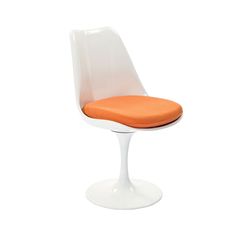 an orange cushion on the back of a white tulip chair, against a white background