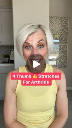 a woman with white hair is holding a chocolate donut in front of her face