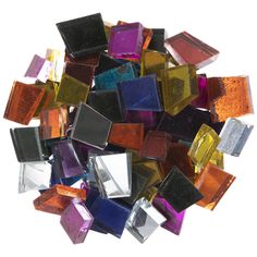 a pile of multicolored glass blocks sitting on top of each other