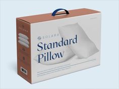 the box is open to show the standard pillow in it's cardboard packaging package