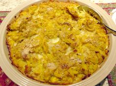 a casserole dish with meat and vegetables in it