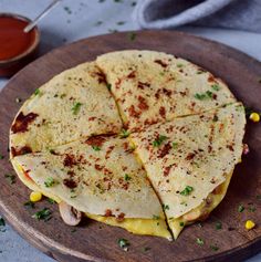 the tortilla has been cut into four pieces and is ready to be eaten