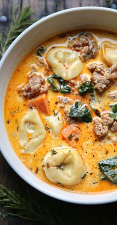 Sausage Tortellini Soup with Spinach in a white bowl. Tasty Soups Healthy, Sausage Tortellini Soup Healthy, One Pot Creamy Sausage Tortellini Soup, Keto Tortellini Soup, Soup Recipes In Crockpot, Sausage Tortellini Soup Crockpot, Creamy Sausage Soup, Soup Thanksgiving, Crockpot Tortellini Soup