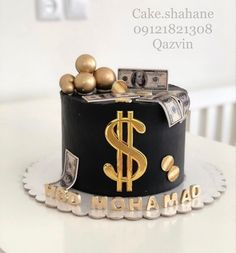 a cake that has money on top of it