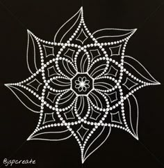 a black and white image with an intricate design on it