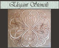 an ornate stencil with the words elegant stencils written in white on it