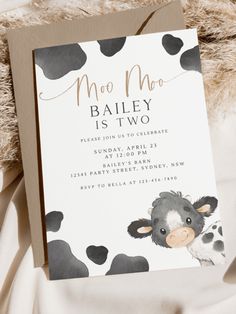 a baby shower is shown with a cow on it's head and the words moo moo bailey is two