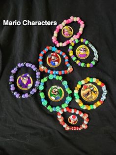 Kandi style bracelets for different mario characters Novelty Plastic Friendship Bracelets, Kandi Friendship Bracelets, Mario Bracelet, Mario Kandi, Matching Kandi Bracelets, Scene Bracelet, Pokemon Bracelet, Scene Bracelets, Bracelets Kandi