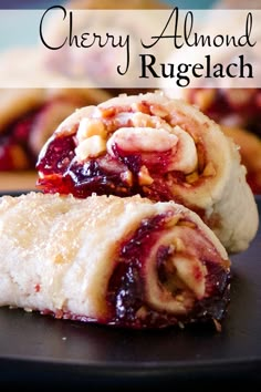 two cranberry almond rolls on a plate with the words cherry almond rugelach