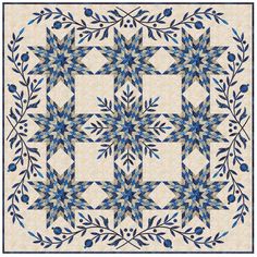 a blue and white quilt with an intricate design on the center, surrounded by leaves