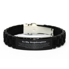 a black rubber bracelet that says to my stepdaughter