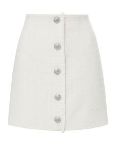 The Melia skirt turns up the texture with classic tweed and fringe trim. Expertly tailored from a luxe cotton blend—with stretch for ease—this chic piece sits high on the waist and falls to just above the knee. Finished with decorative crest buttons and a hidden back zipper, it makes for an elegant ensemble with the matching Olbia jacket.70% cotton, 18% polyester, 12% rayonLining: 96% polyester, 4% spandexDry clean onlyStyle #2405TW3430447 Fashion Girlies, Plus And Minus, Tweed Skirt, Sweaters And Jeans, Fringe Trim, Veronica Beard, Skorts, Top Sales, Jacket Sale