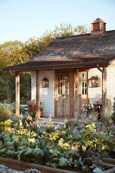 the instagram page on instagram com shows an image of a small house with flowers and