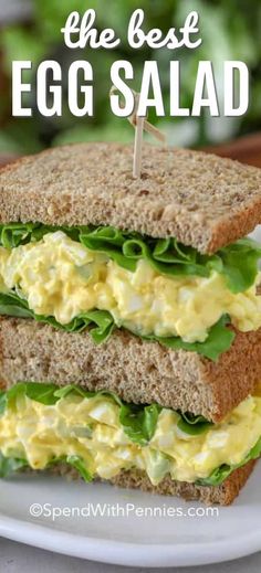 an egg salad sandwich on a white plate