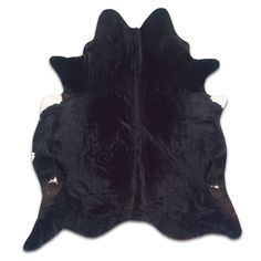 a black and white cowhide rug on a white background