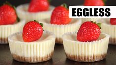 small cupcakes with strawberries on top and the words eggless written above them