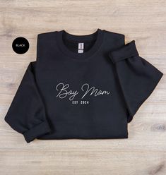 Stay cozy and stylish in this Boy Mom Sweatshirt! This Mama Sweatshirt is the perfect way to show off your motherly pride. Whether you're a Boy Mama or just a Momma looking for a cute sweater, this top makes a great gift for any occasion. Treat yourself or surprise an Expecting Mom with this thoughtful present that she'll cherish forever. Show the world how proud you are to be a Boy Mom with this comfortable and trendy sweatshirt! PRODUCT DETAILS 💡 ✅ Material: 50% cotton and 50% polyester  ✅ Me Boy Mom Sweatshirt, Boy Mom Shirt, Mom Of Boys Shirt, Mama Sweater, Boy Mama, First Time Mom, Expecting Mom Gifts, Mama Shirts, Presents For Mom