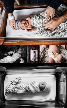 a man holding a baby in an inclosure with his hands on the bed