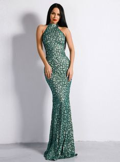 Captivating and sexy, this Green Sequins Halter Party Dress by Kemedress is a sequins blissful dream come true. The sheer bodice of this silhouette mermaid dress is so pretty adorned with sequins. A high sequin halter neckline perfectly complements the of this party dress. The detailed sequin work on whole dress and shape the body, while the romantic hemline floor length over silver Regency sequins mermaid gown graciously flares at floor, giving this skirt an enviable mermaid silhouette. Its zipper up back shapes up your body perfectly. Its sleeveless style adds to be an alluring effect and makes you sexier. Bodycon Prom Dress, Halter Party Dress, Prom Dresses Long Mermaid, Sequin Evening Dresses, Sequin Party Dress, Prom Dresses Online, Green Sequins, Mermaid Gown, Maxi Dress Evening