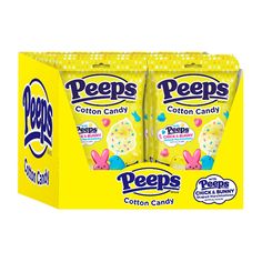 two bags of peeps cotton candy sitting in front of each other on a white background