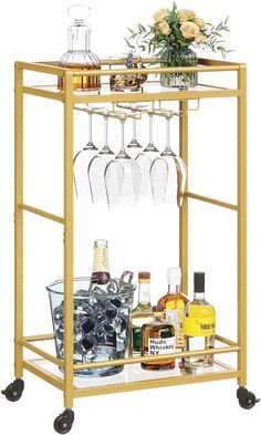 2 shelves gold bar cart priced under $50. rolling wheels that lock in place. Bar Cart Gold, Liquor Cart, Living Room Gold, Beverage Cart, Kitchen Dining Living Room, Gold Bar Cart, Drink Cart, Serving Bar, Kitchen Dining Living