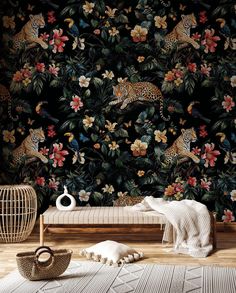 a wallpapered room with a leopard and flowers on the wall next to a bench